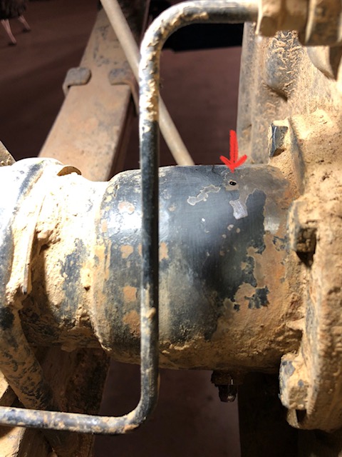 Rear wheel bearing grease weep hole.jpg